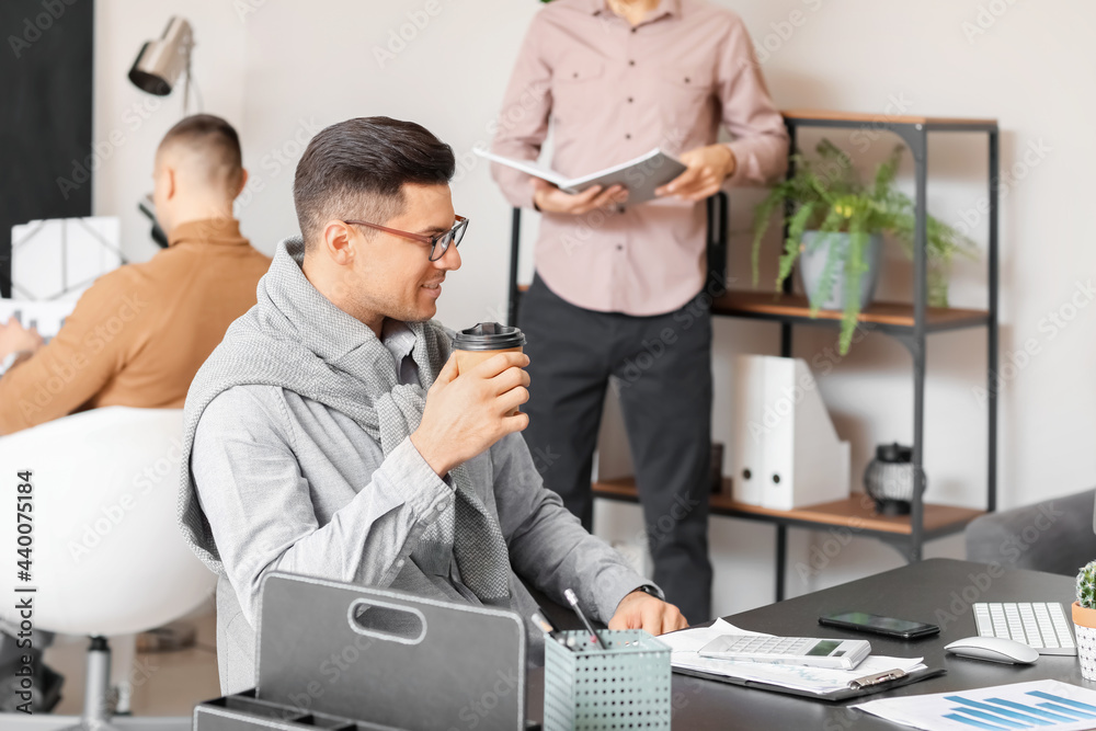 Fototapeta premium Male accountant working in office
