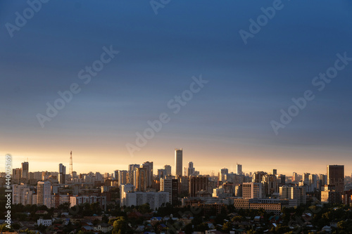 Dawn clouds over the metropolis on storm © kirillk
