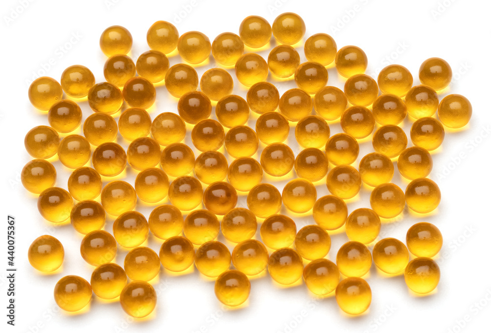 Pile of capsules Omega 3 on white background. Close up, top view