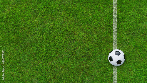 classic soccer ball on textured real green lawn