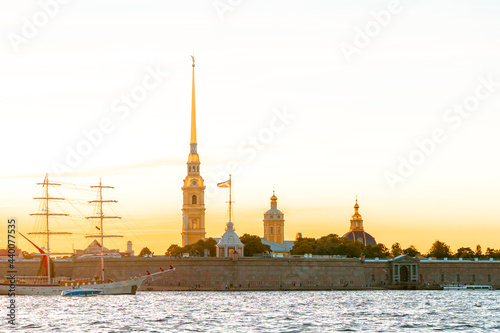 Panoramic view of the beautiful sunset over the Neva River in St. Petersburg and pleasure boats with tourists. Saint Petersburg, Russia - 05 Apr 2021