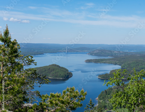 Beautiful view of Swedish landscape at The High Coast (UNESCO World Heritage site) in Northern Sweden. The High Coast bridge can be seen in the distance