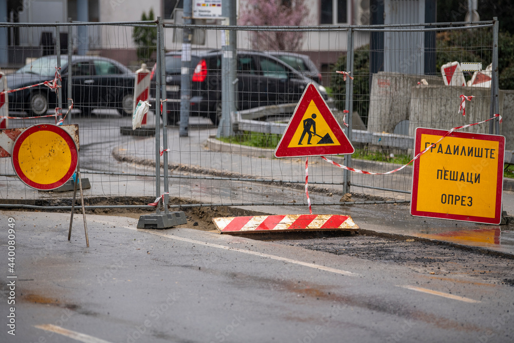 inner-city-road-closed-by-signs-and-boundary-around-street-works