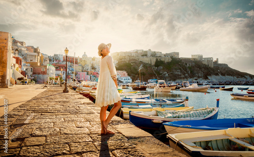 Italian summer fashion - happy girl in a white lacy dress
