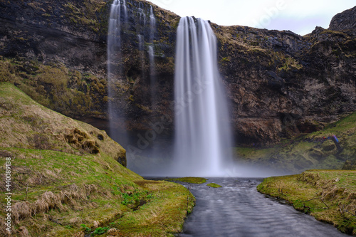 Fototapeta Naklejka Na Ścianę i Meble -  Seljalandsfoss falls in Iceland on a spring day with heavy water fall