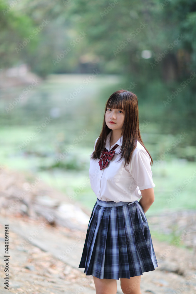 beautiful asian japanese school girl uniform looking at park outdoor beautiful asian japanese school girl uniform looking at park outdoor
