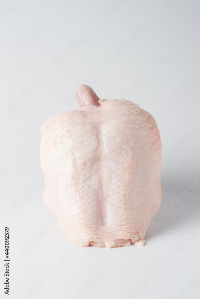 Fototapeta premium raw chicken breast with skin, white background