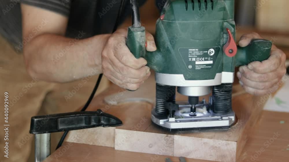 Craftsman Making Guitar Body Craftsman Making Guitar Body