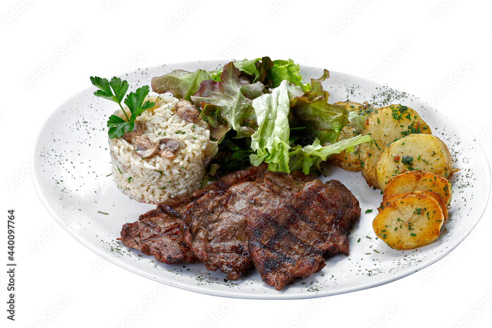 Beef steak with potatoes and rice in isolated white background