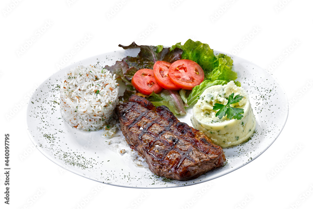 Beef steak with potatoes and rice in isolated white background Beef steak with potatoes and rice in isolated white background