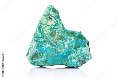 Amazing closeup macro of natural raw turquoise chrysocolla rough from Peru isolated on white background. Piece of raw uncut Crisocola mineral stone photo