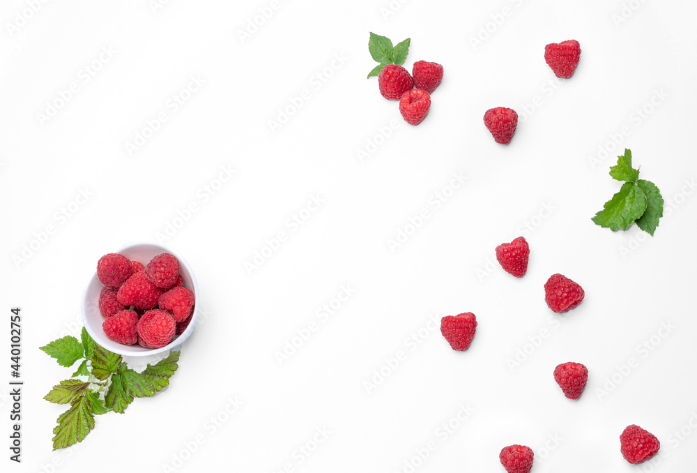 Fresh Raspberries in a bowl on white background