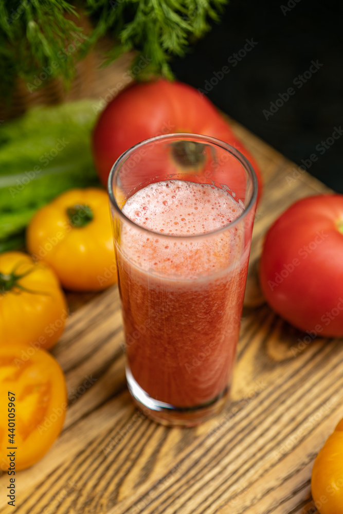 Tomato juice, on a children's table, near the green and yellow and red tomatoes
Tomato juice, on a children's table, near the green and yellow and red tomatoes