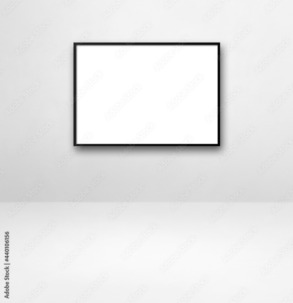Black picture frame hanging on a white wall Black picture frame hanging on a white wall