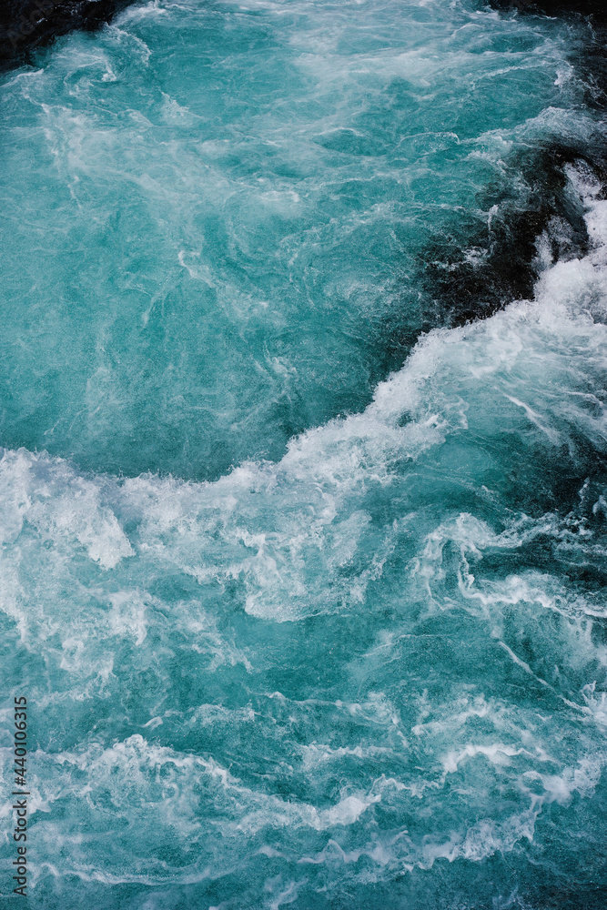 Bruarfoss waterfall in Iceland as an abstract of the blue water and whitewater from above Bruarfoss waterfall in Iceland as an abstract of the blue water and whitewater from above