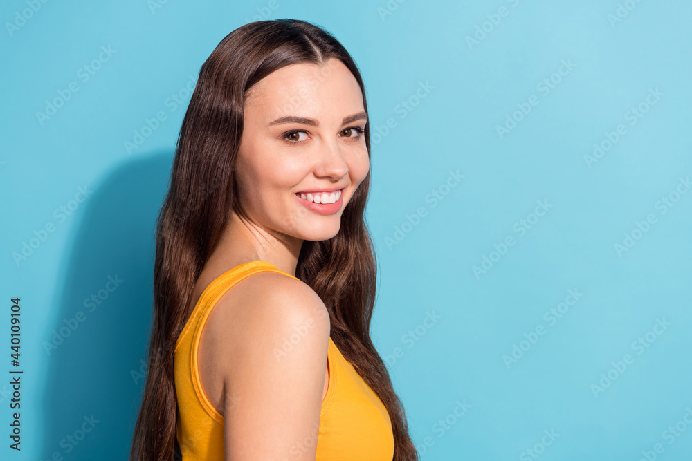 Photo portrait girl pretty cheerful smiling wearing yellow clothes isolated pastel blue color background copyspace Photo portrait girl pretty cheerful smiling wearing yellow clothes isolated pastel blue color background copyspace