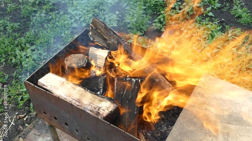 Brazier with fire and coals for cooking on the fire.
