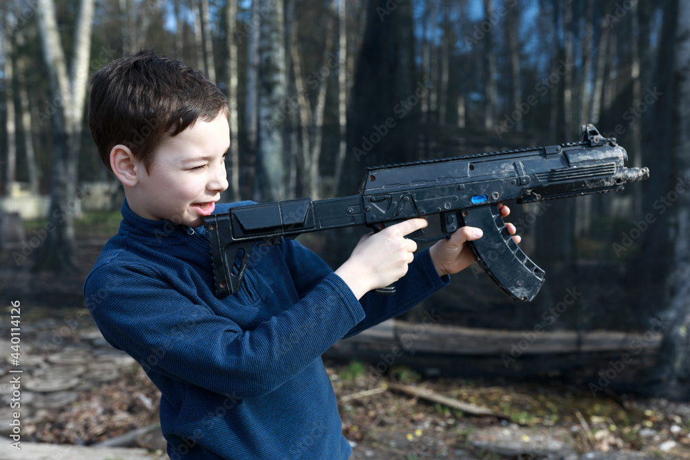 Fototapeta premium Kid playing laser tag