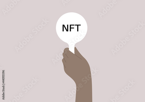 An isolated hand holding a bid with an NFT sign on it, online auction, digital art on sale, new technologies and money investment