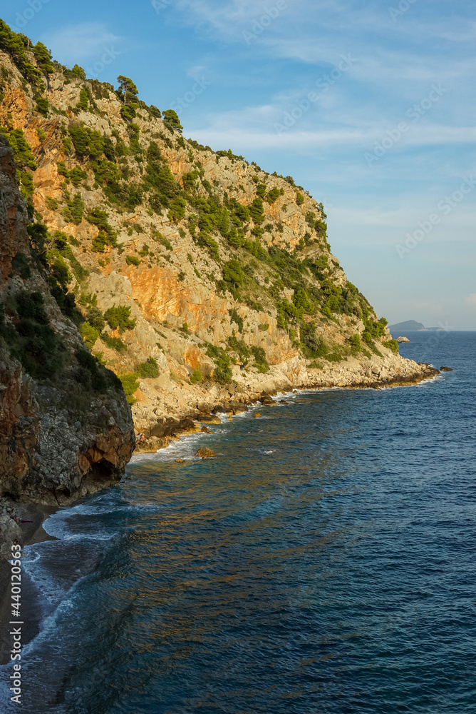 Fototapeta premium Croatia, Pasjaca beach and cliffs near Dubrovnik. Beautiful landscape taken at sunset. Seaside at sunset time.