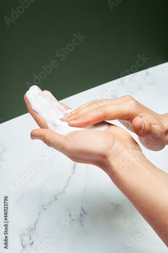 Wallpaper Mural Woman applying soap sud over table Torontodigital.ca
