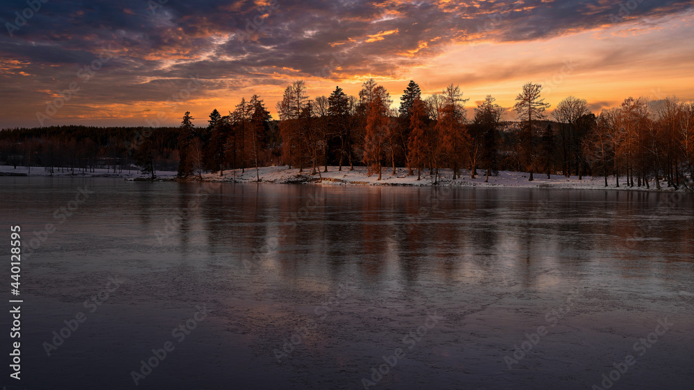 Ice and fire. The sky is in fire and the lake is frozen. From Norway, Bogstadvannet.