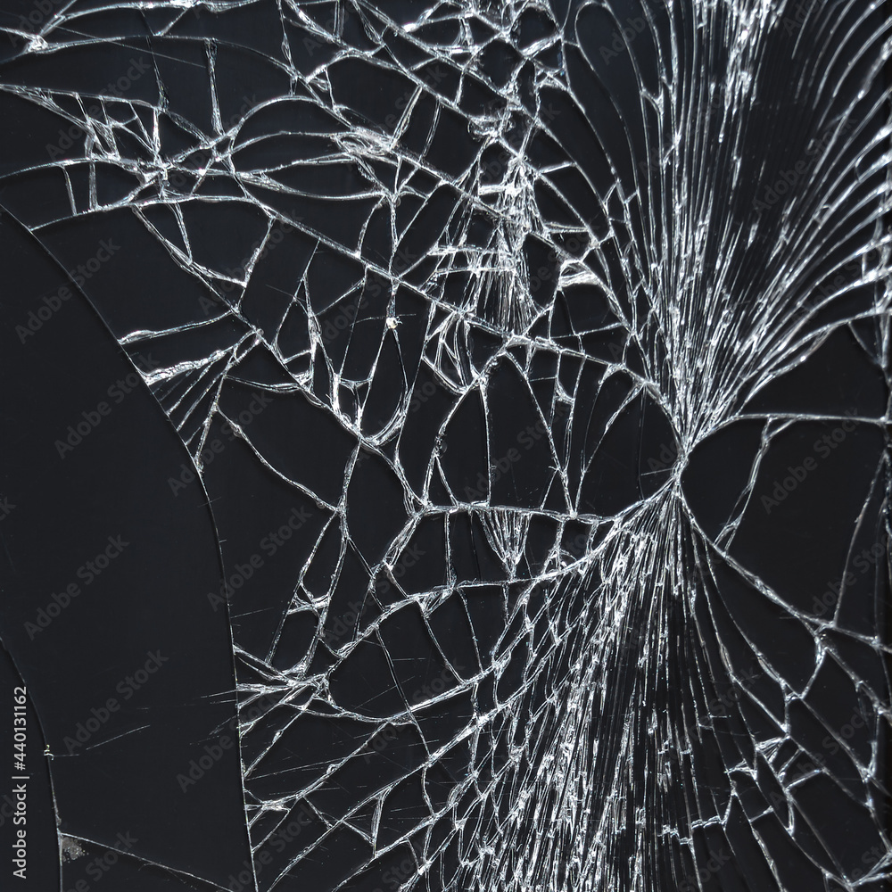 Broken glass of a smartphone with cracks on a black background for concept, collage, mockup. Close-up of cracks in the glass as white on black Stock Photo | Adobe Stock Broken glass of a smartphone with cracks on a black background for concept, collage, mockup. Close-up of cracks in the glass as white on black Stock Photo | Adobe Stock