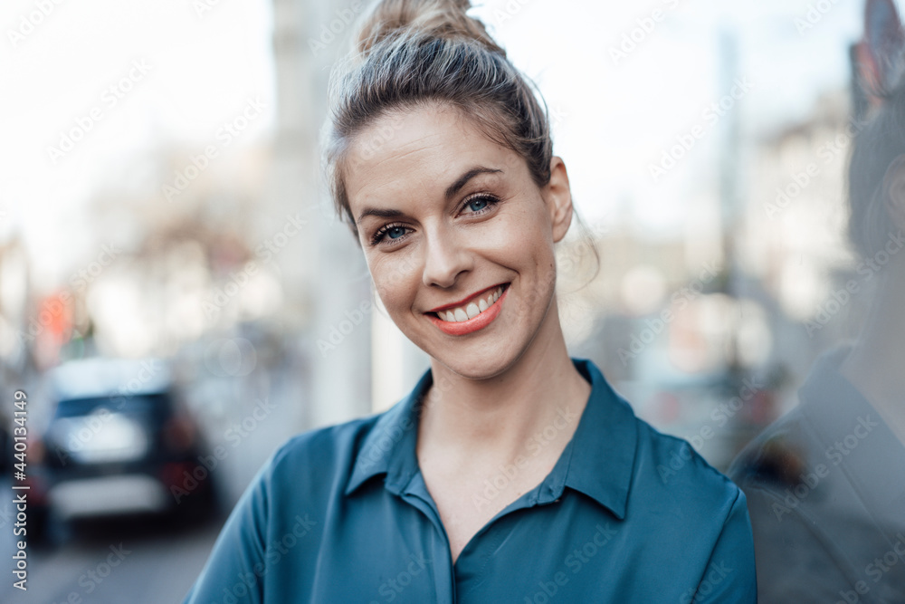 Mid adult female entrepreneur smiling Mid adult female entrepreneur smiling