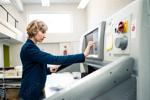 Expertise operating printing machine in workshop