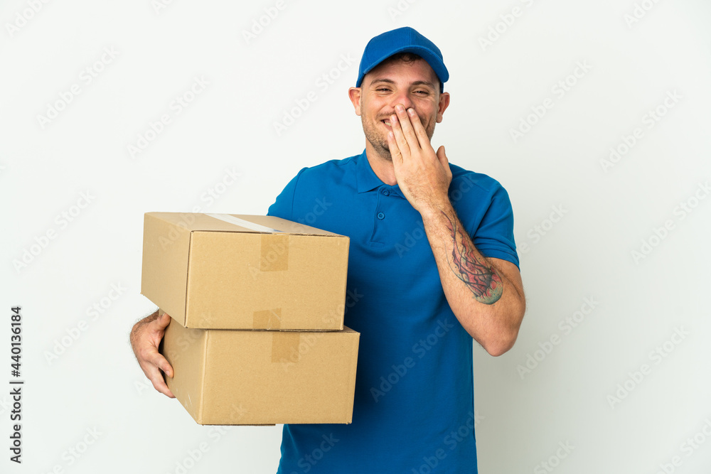 Delivery caucasian man isolated on white background happy and smiling covering mouth with hand Delivery caucasian man isolated on white background happy and smiling covering mouth with hand