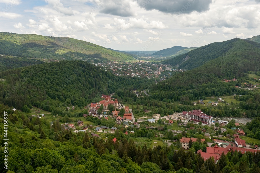 panorama top view of the city of Yaremche Ukraine between the mountains and clouds in summer photo from a drone