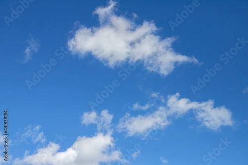Blue sky with white cumulus clouds on a daytime