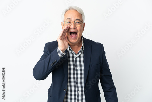 Middle age Brazilian man isolated on white background with surprise and shocked facial expression