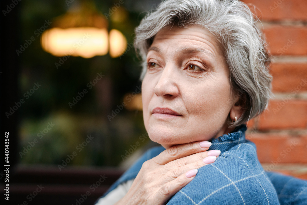 Thoughtful woman looking away at cafe Thoughtful woman looking away at cafe