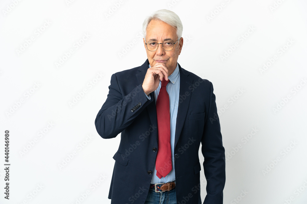 Middle age Brazilian business man isolated on white background thinking Middle age Brazilian business man isolated on white background thinking
