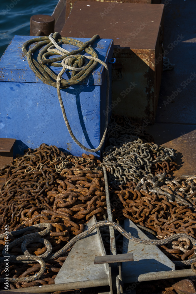 rusty chain and anchor on an old pontoon on Lake Geneva, Switzerland