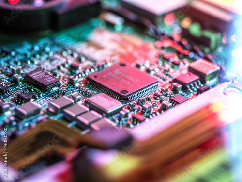 Inside of computer hardware showing chips and circuit board photo