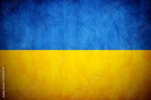 Ukraine flag on the grunge concrete wall