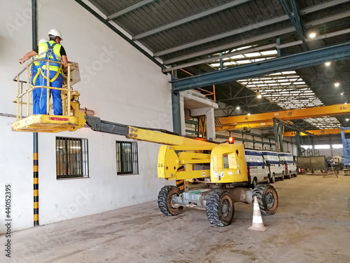 Paterna, Valencia, Spain: 10.22.2020; The  mobil elevating platform with workers