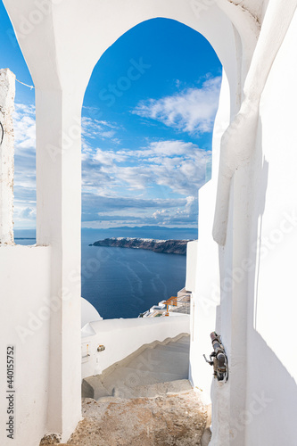 Greece, Santorini, Fira, Gate and steps in white-washed coastal town photo