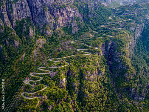 Norway, Rogaland, Lysebotn, Aerial view of cable cars and road winding along steep cliff