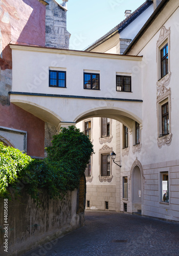 Bridge between Church of the Assumption and the city palace, Schwaz, Tyrol, Austria photo