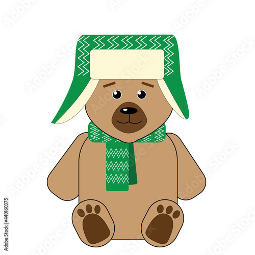Cute brown bear in a green hat with earflaps and a scarf.