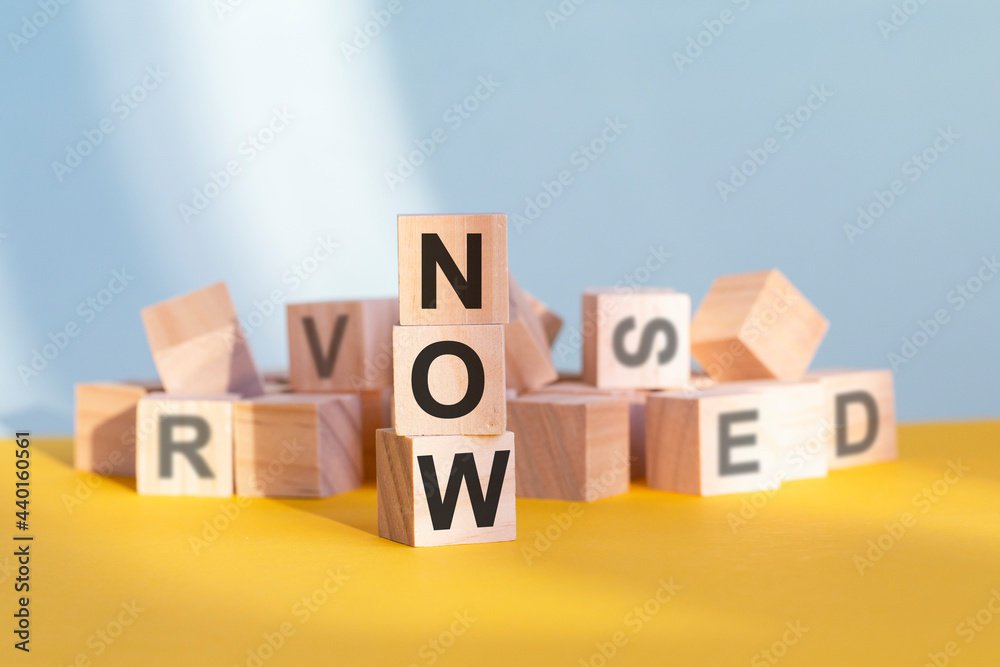 NOW message on yellow background. Now made with building blocks. NOW message on yellow background. Now made with building blocks.