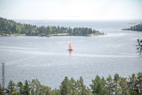 Beautiful view of a boat with sails on Lake Ladoga Republic of Karelia. The nature of the North of Russia.