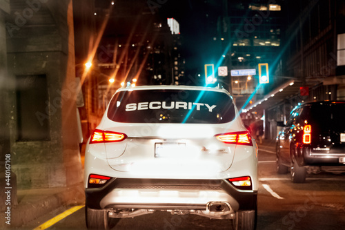Obraz na plátne Closeup shot of a security company car operating to patrolÂ the city