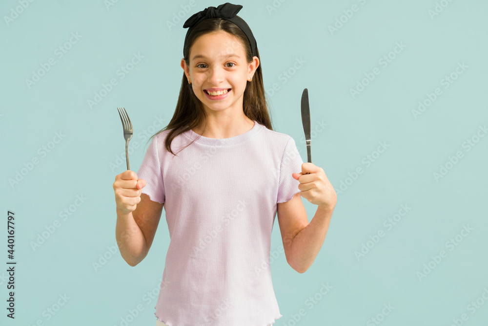 Happy preteen girl about to eat her lunch Happy preteen girl about to eat her lunch