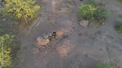 Desert Hike with White Female Backpacker in Heat in the Early Morning Aerial Drone photo