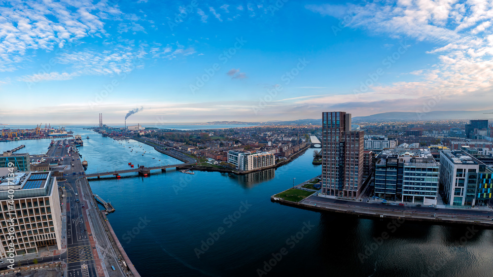Fototapeta premium Dublin Ireland - Aerial view of Dublin dockland district with the Capital Dock apartment block in the centre