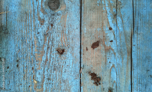 The wall of a village hut made of wooden boards. Natural material.